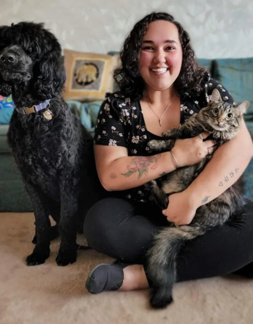 Morgan with a Brown Cat and a Black Dog